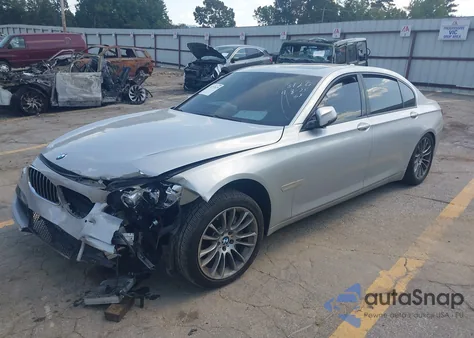 2014 BMW 740Li из США, поврежденный, VIN WBAYE4C58ED138126